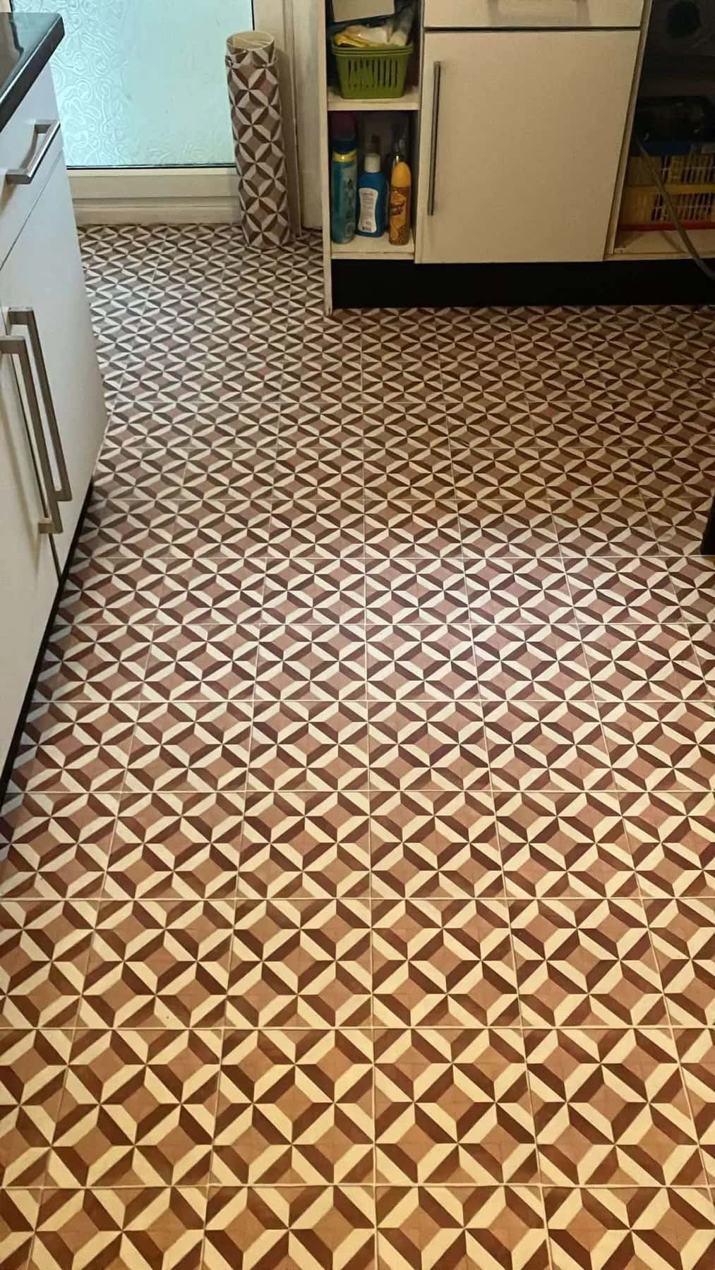 Gold and brown geometric pattern vinyl fitted in a hallway
