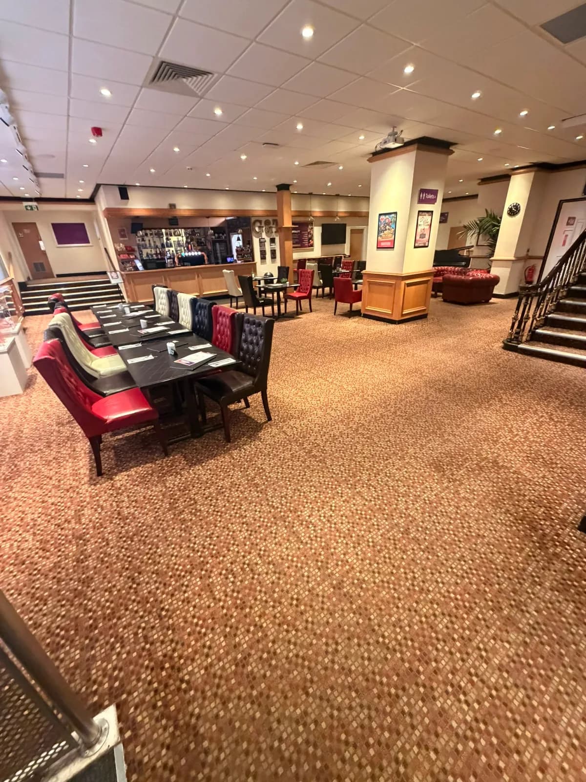 The Burnley Mechanics foyer and bar on its original patterned carpet, before the floor was replaced