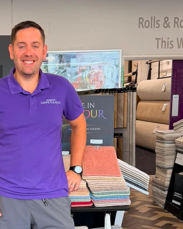 Simon Sharman in the Boundary Carpets & Beds showroom in Colne